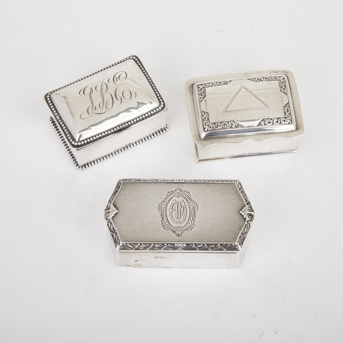 Three North American Silver Stamp Boxes, 20th century