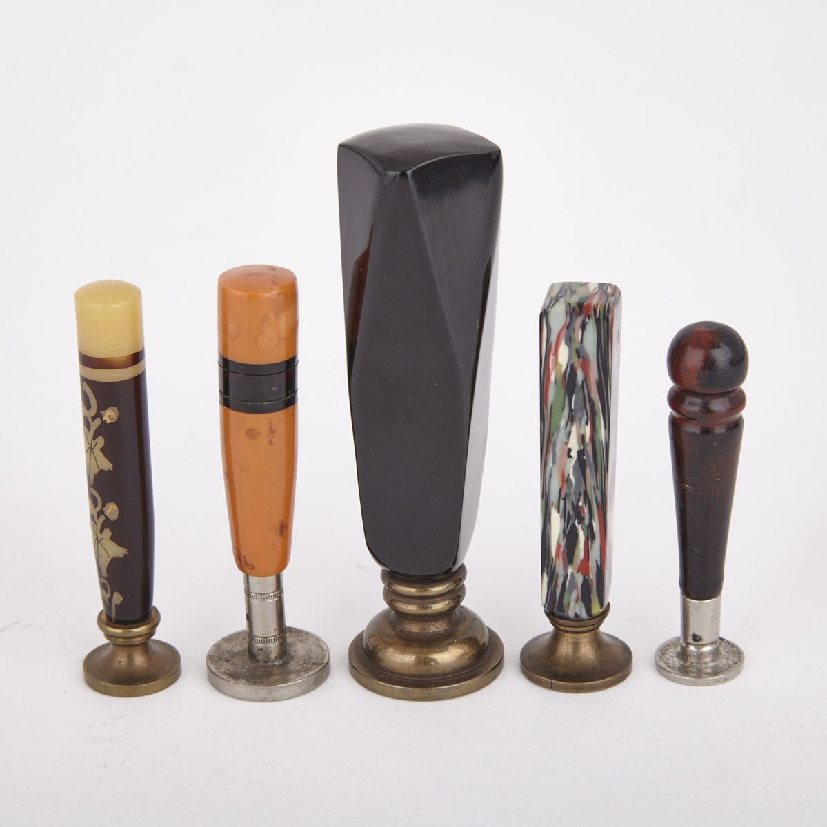 Five Resin Handled Desk Seals, early 20th century