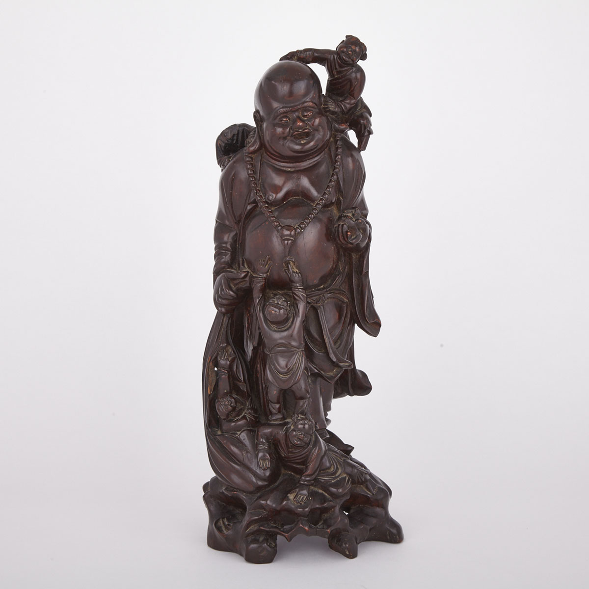 A Boxwood Carving of Buddha with Boys, Early 20th Century