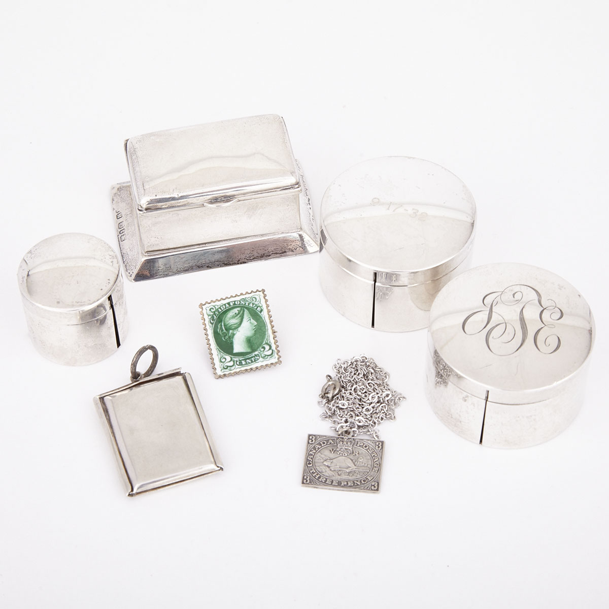 Five Various Silver Stamp Boxes, Stamp Pendant and an Enamel Brooch, 20th century
