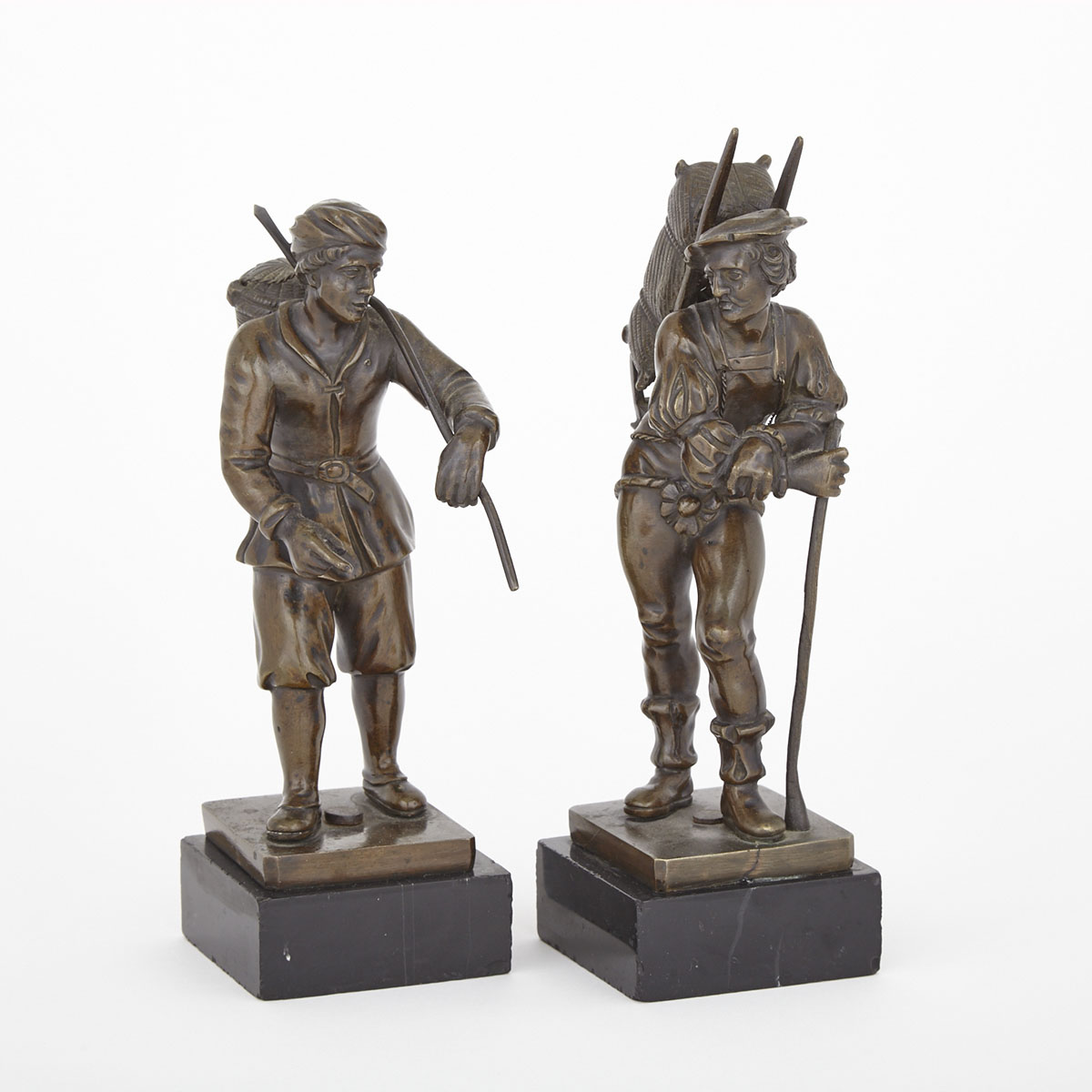 Pair of Continental Patinated Bronze Figures of Peddlars, 19th century