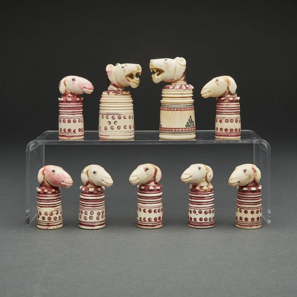 Indian Turned and Carved Bone Animal Head Form Part Chess Set, 19th century