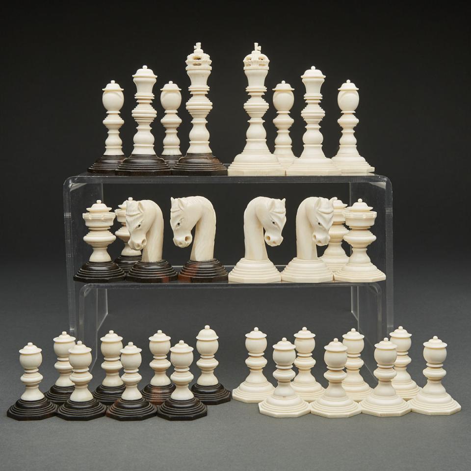 Large Turned and Carved Ivory and Ebony Chess Set, Late 19th/early 20th century