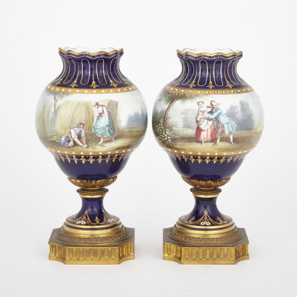 Pair of Ormolu Mounted ‘Sèvres’ Blue Ground Vases, late 19th century
