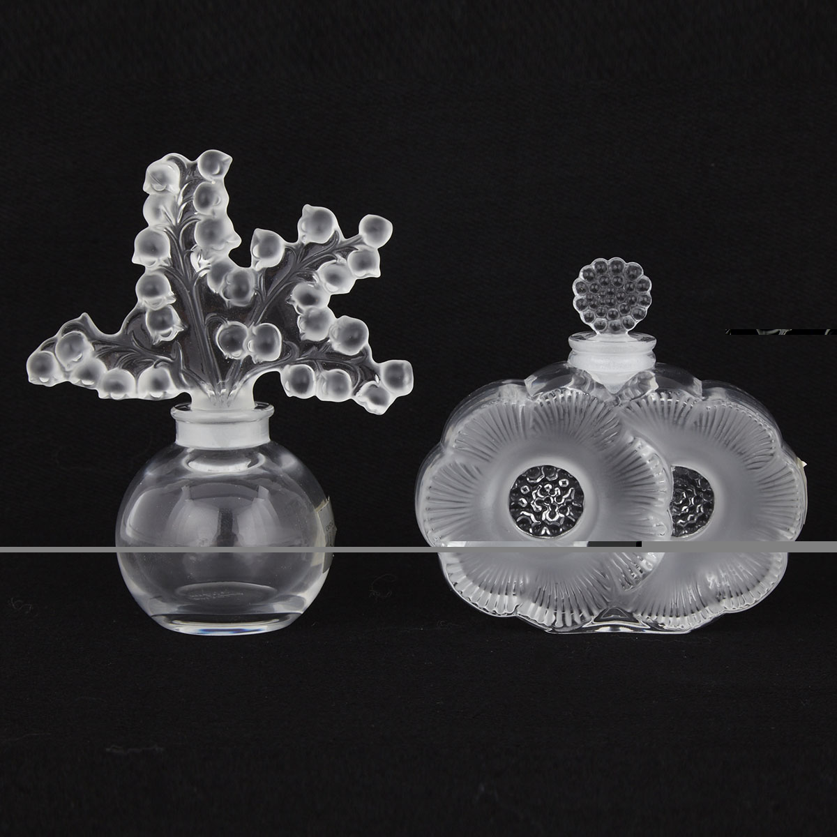 ‘Deux Fleurs’ and ‘Clairefontaine’, Two Lalique Glass Perfume Bottles, 20th century