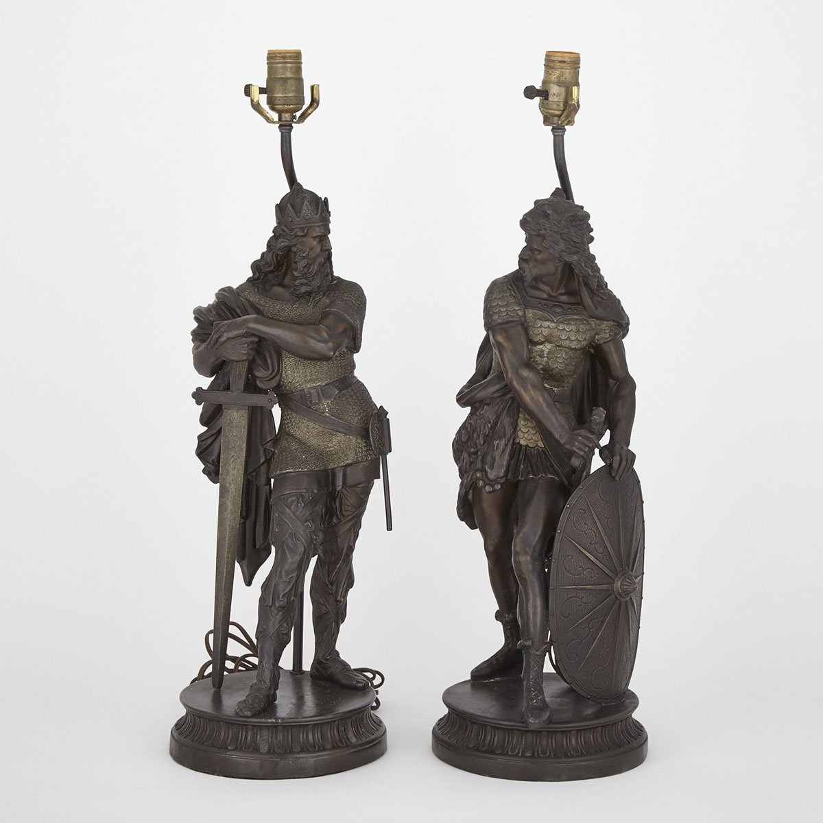 Pair of Patinated White Metal Figural Table Lamps Modelled as Nordic Vikings, late 19th/early 20th century