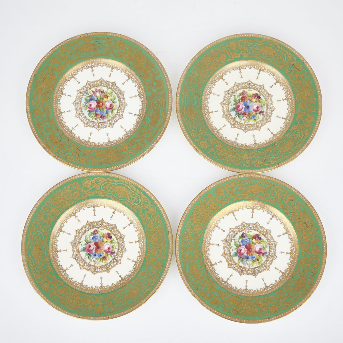 Four Minton Floral Centred Apple Green Ground Service Plates, Joseph Colclough, early 20th century