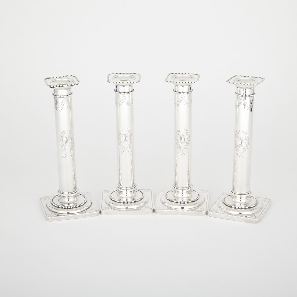 Four American Silver Table Candlesticks, William B. Durgin Co., Concord, N.H., early 20th century
