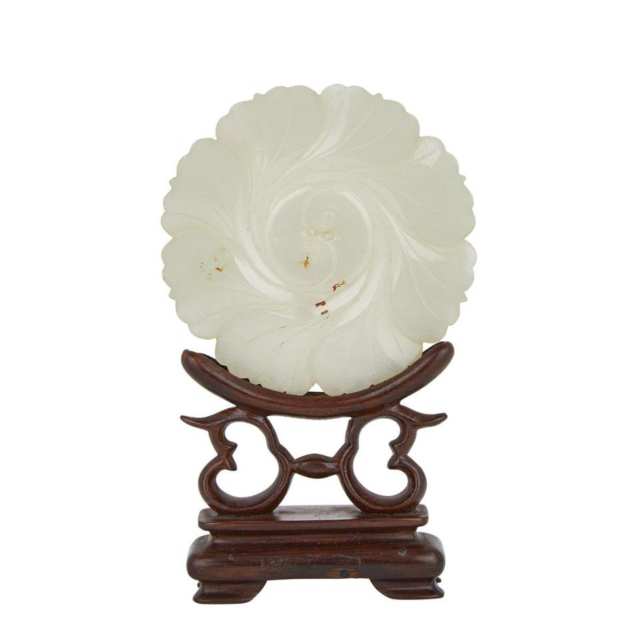 A Celadon White Jade Floral Pendant with a Rosewood Stand, Qing Dynasty, 18th Century 