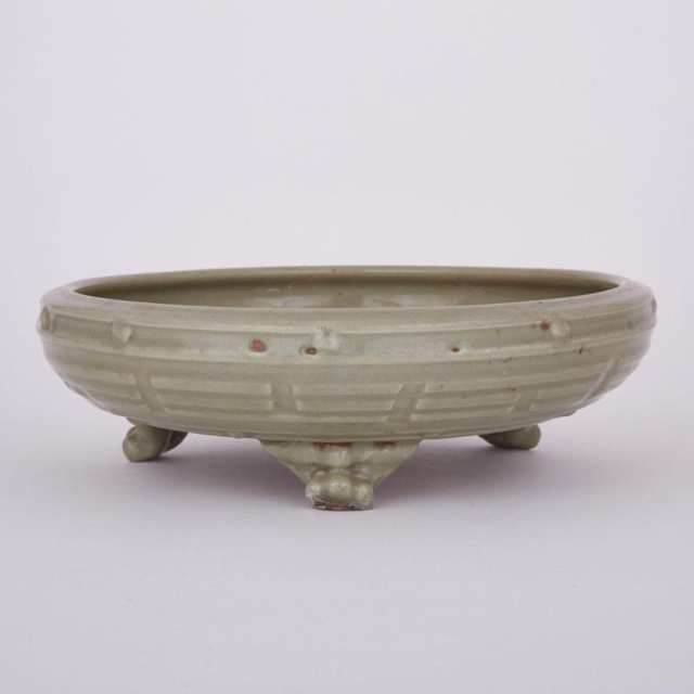 A Celadon Tripod Shallow Censer, Yuan/Ming Dynasty, Circa 1300-1400