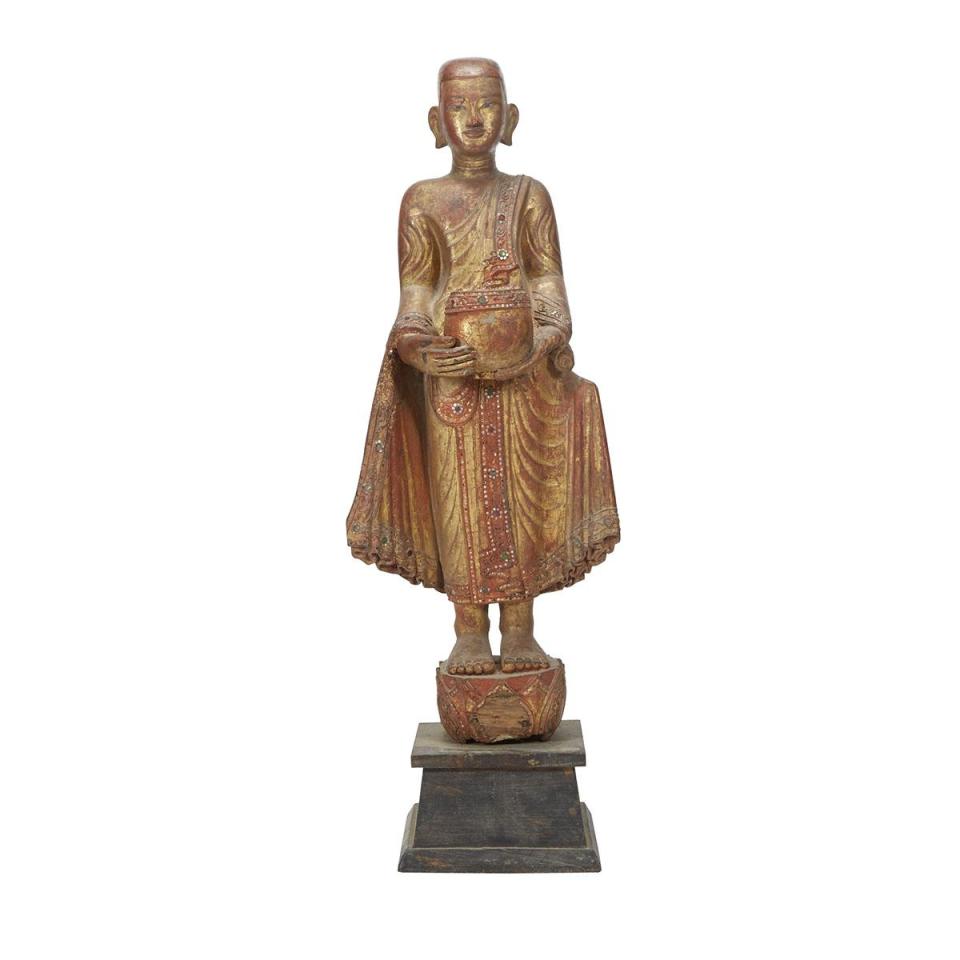 A Carved Lacquered Wood Burmese Standing Monk, Mandalay Period, 19th Century