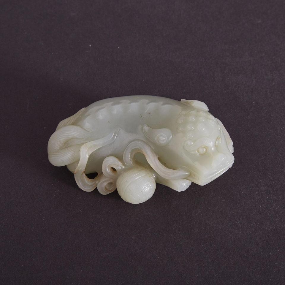 A Celadon-White Jade Recumbent Lion, 18th/19th Century