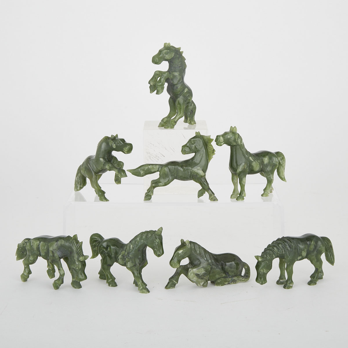 Cased Set of Eight Chinese Carved Spinach Jade Horses, mid 20th century