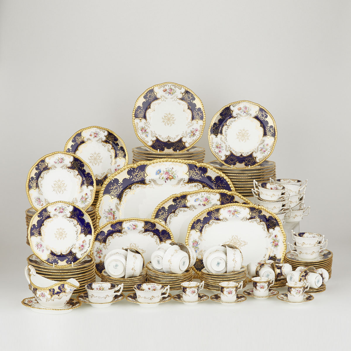 Coalport Floral Paneled Blue and Gilt Service, early 20th century