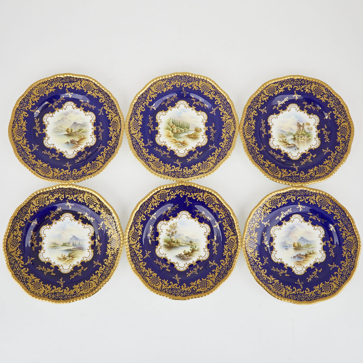 Six Coalport Blue and Gilt Topographical Plates, Percy Simpson, early 20th century 