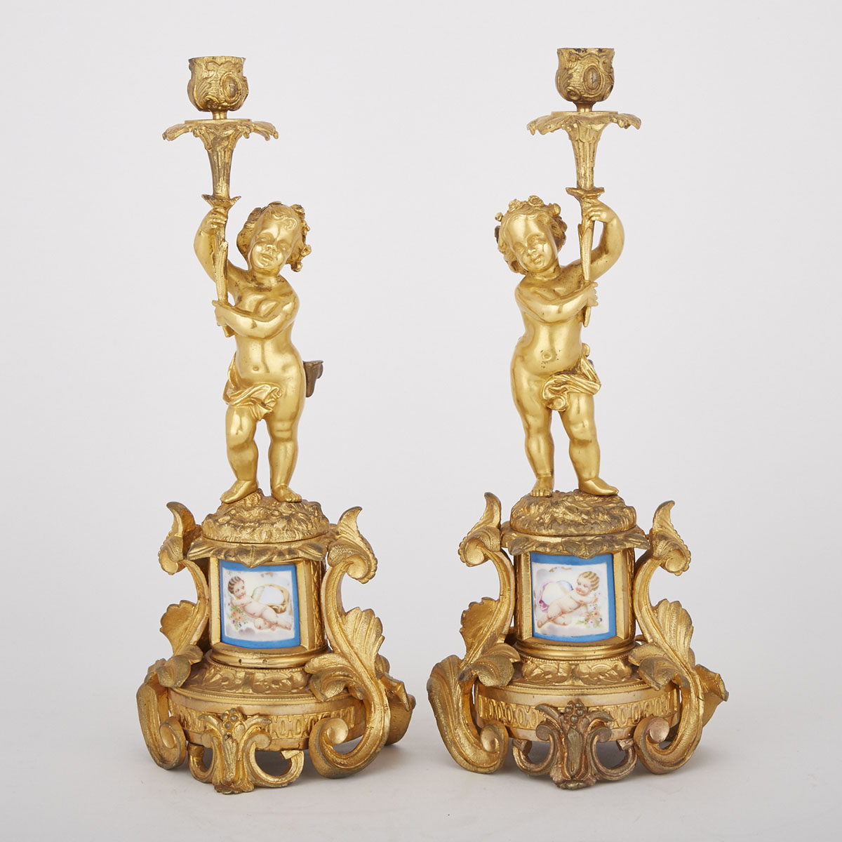 Pair of French Sevres Style Porcelain Mounted Gilt Bronze Figural Candlesticks, c.1870