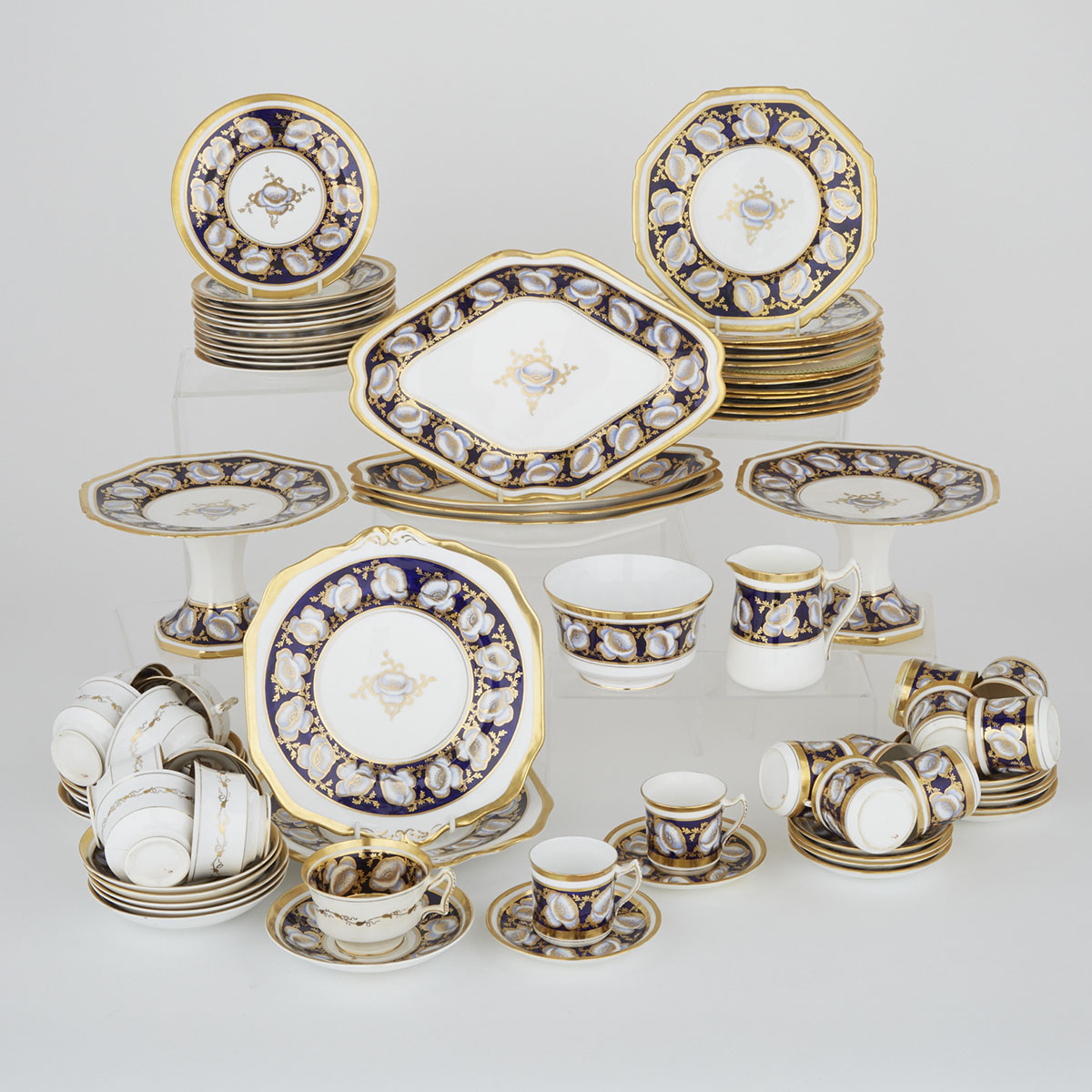 English Porcelain Blue and Gilt Banded Service, early 19th century