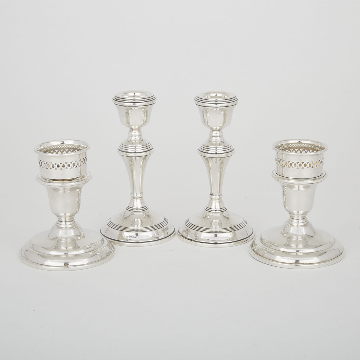 Pair of English Silver Candlesticks, Broadway & Co., Birmingham, 1966 and Another Pair, Henry Birks & Sons, Montreal, Que., 20th century