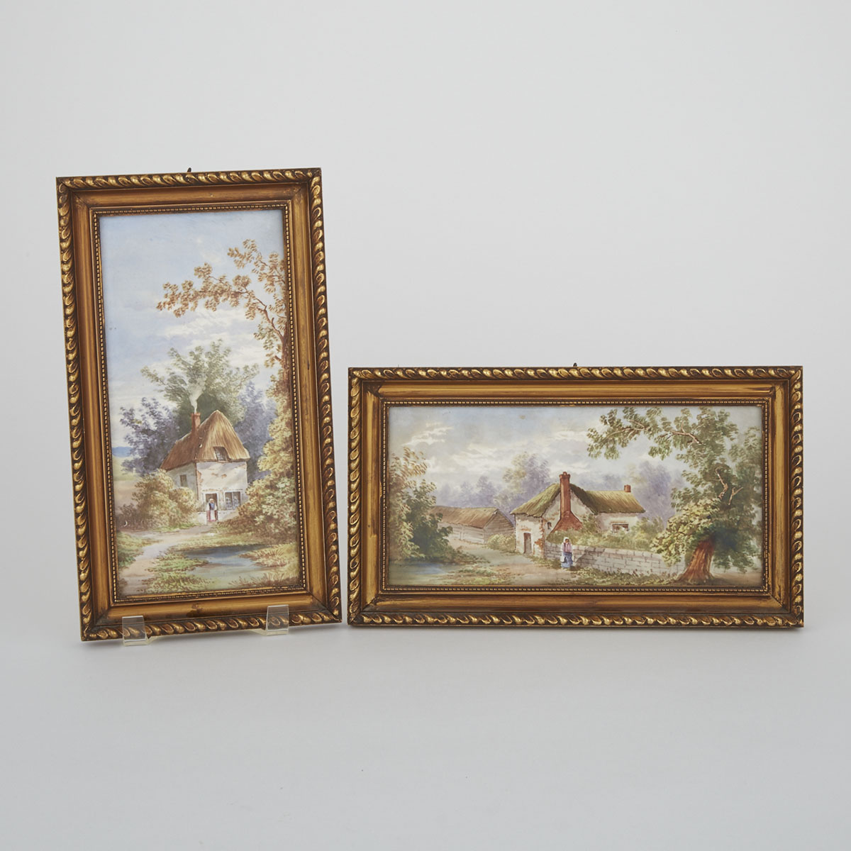 Two Continental Earthenware Rectangular Cottage Scene Plaques, late 19th century