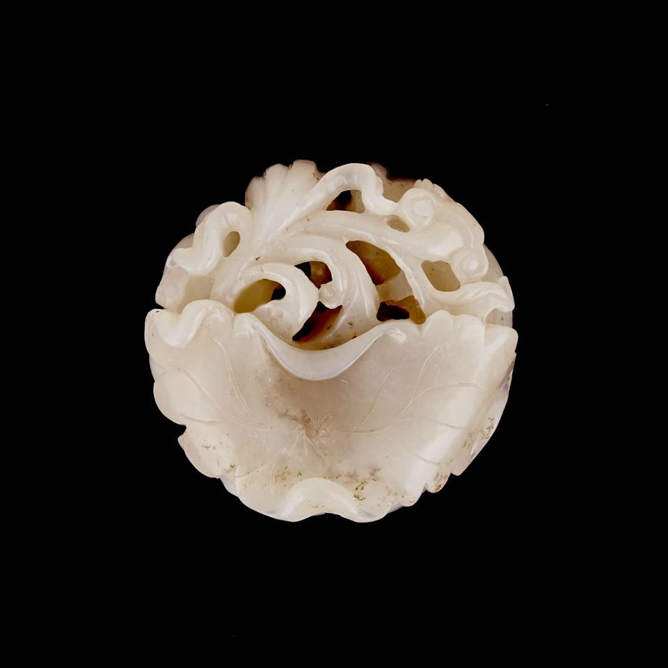 A White Jade Carving of Two Fish and Lotus