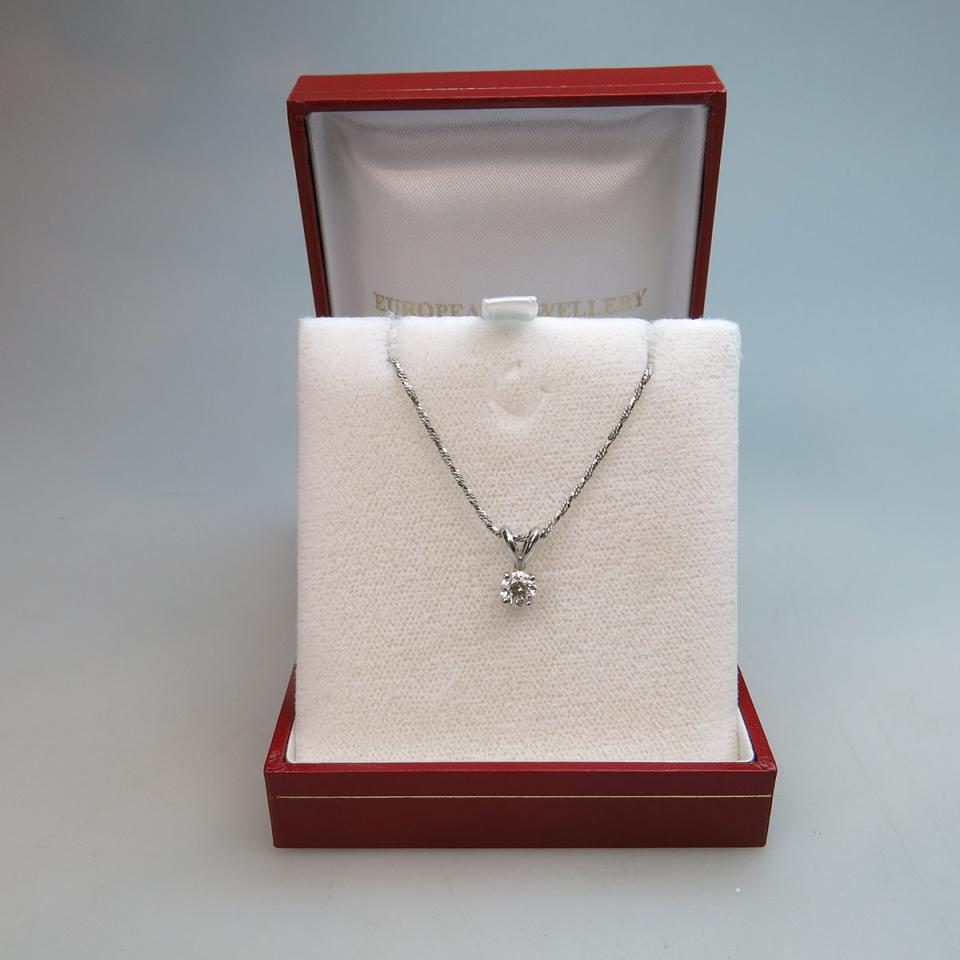 14k White Gold Solitaire Pendant And Chain