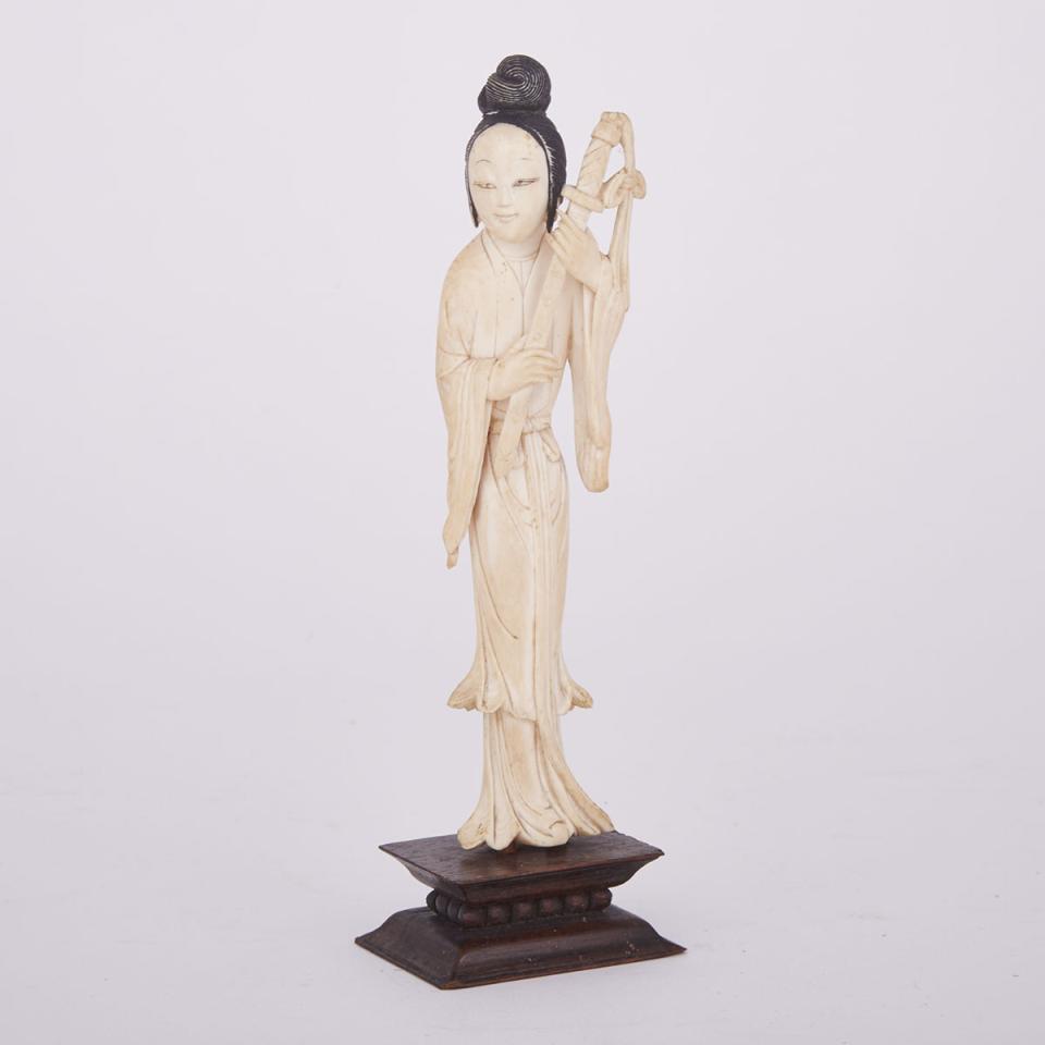 A Carved Ivory Lady with Sword, Circa 1920