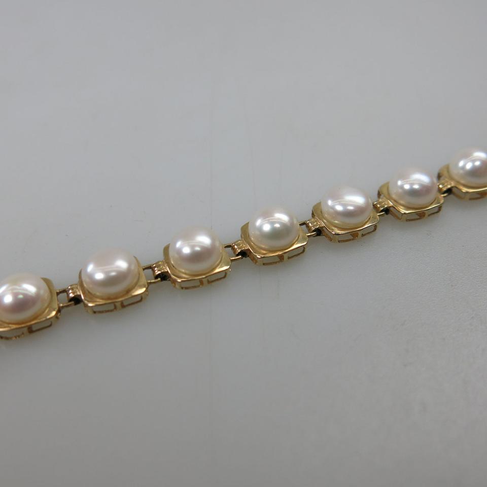 14k Yellow Gold And Freshwater Button Pearl Bracelet