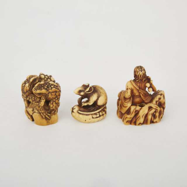 Two Carved Ivory Netsuke and a Carved Ivory Toad Group, Meiji Period