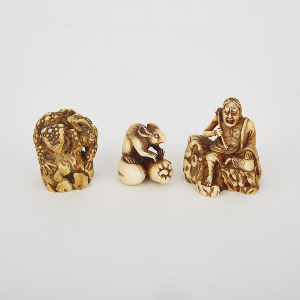 Two Carved Ivory Netsuke and a Carved Ivory Toad Group, Meiji Period