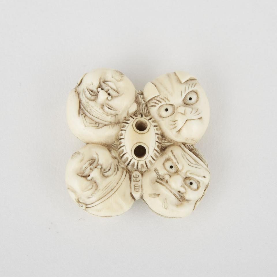 A Carved Ivory Mask Netsuke, Meiji Period