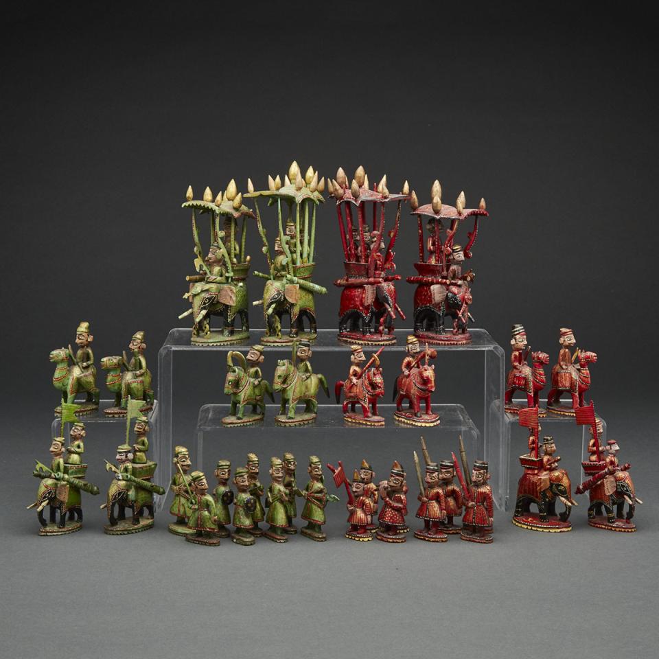 Indian Carved, Polychromed and Parcel Gilt Ivory Figural Chess Set, Rajasthan, late 19th/20th century