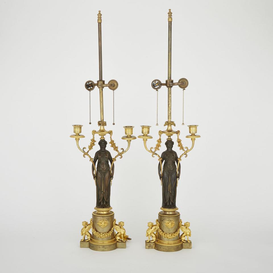 Pair of French Second Empire Patinated and Gilt Bronze Figural Candelabra, mid 19th century