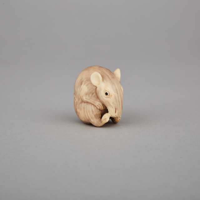 An Ivory Carved ‘Longevity Group’ Netsuke
