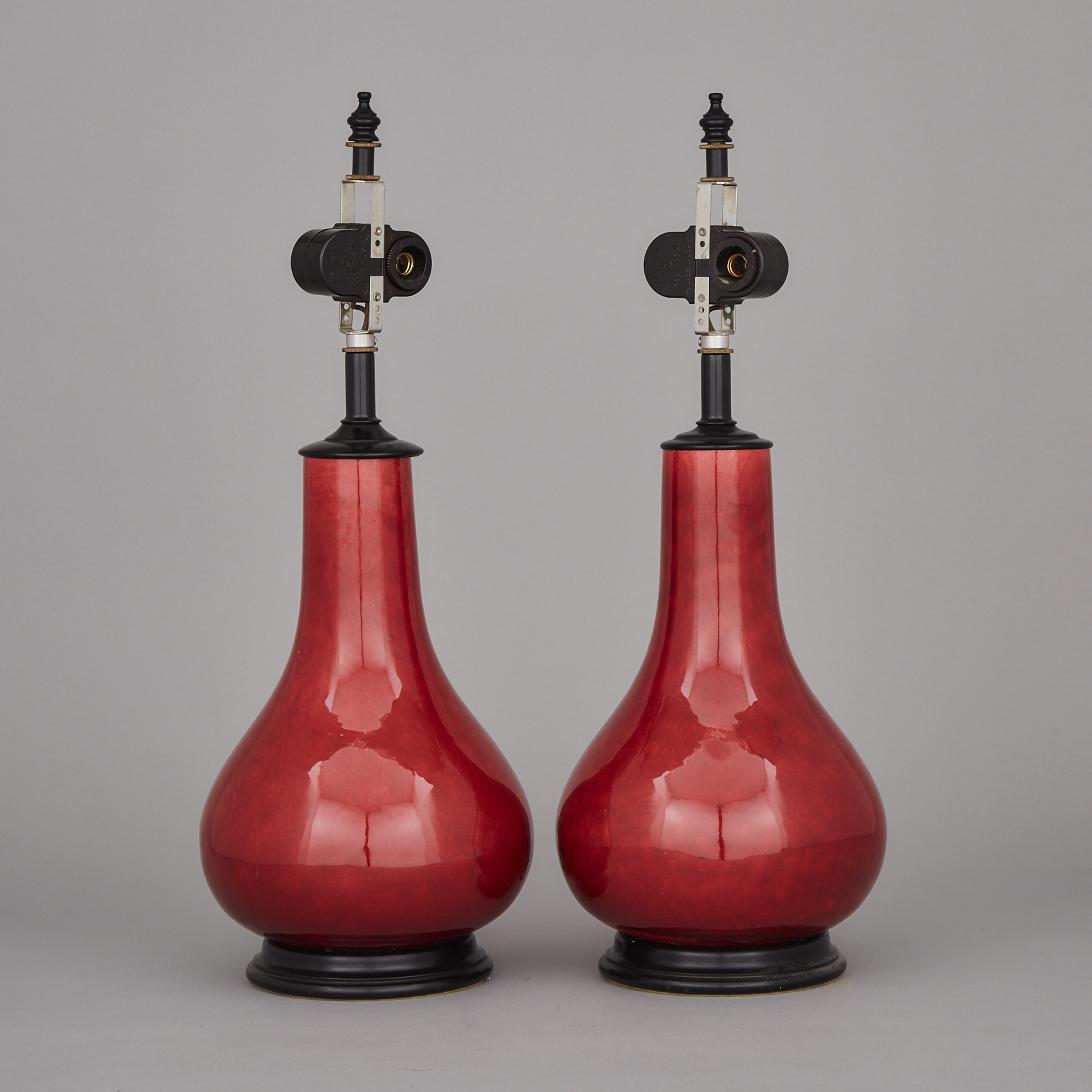A Pair of Red Glazed Vase Lamps