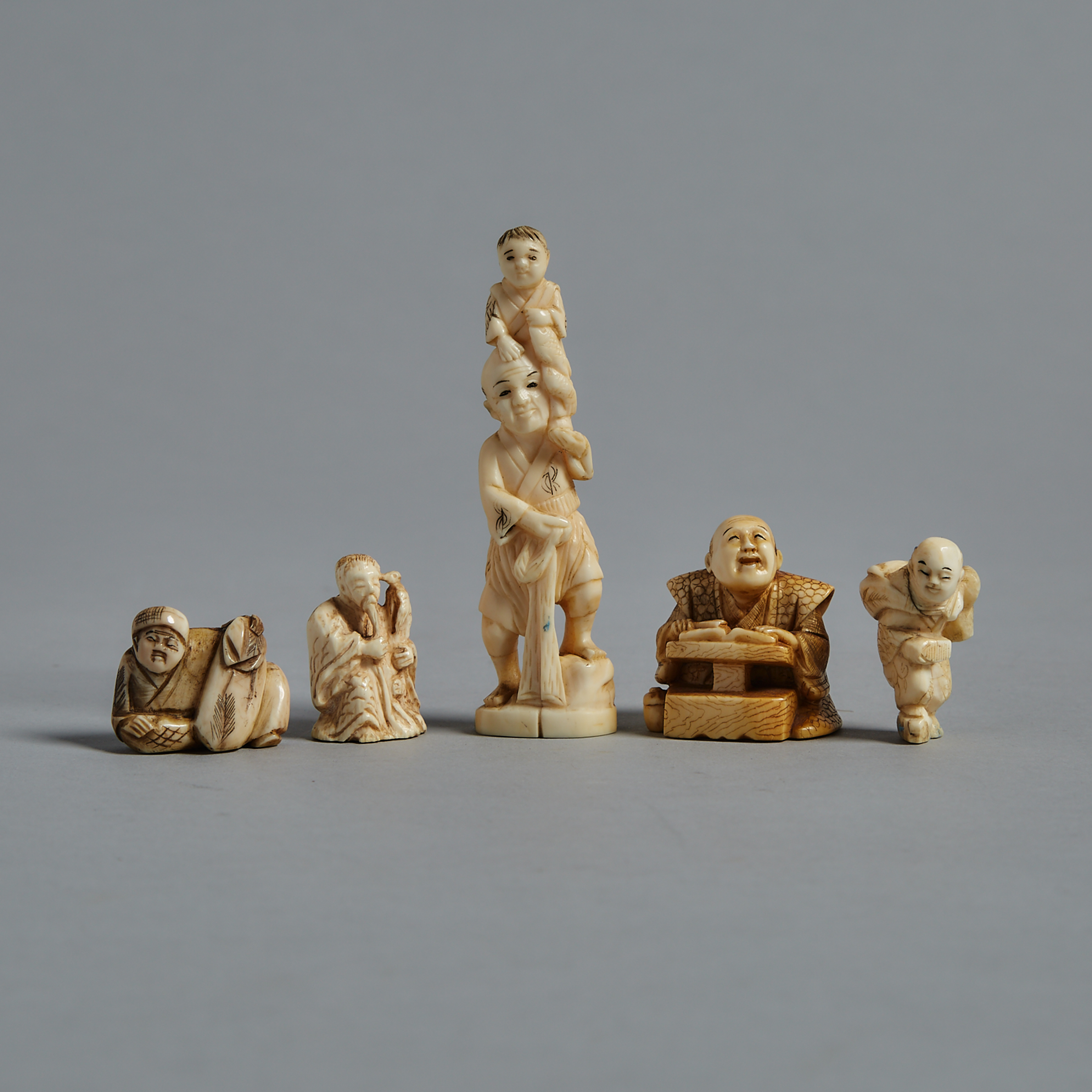 A Group of Five Ivory and Bone Carved Netsuke, Meiji Period