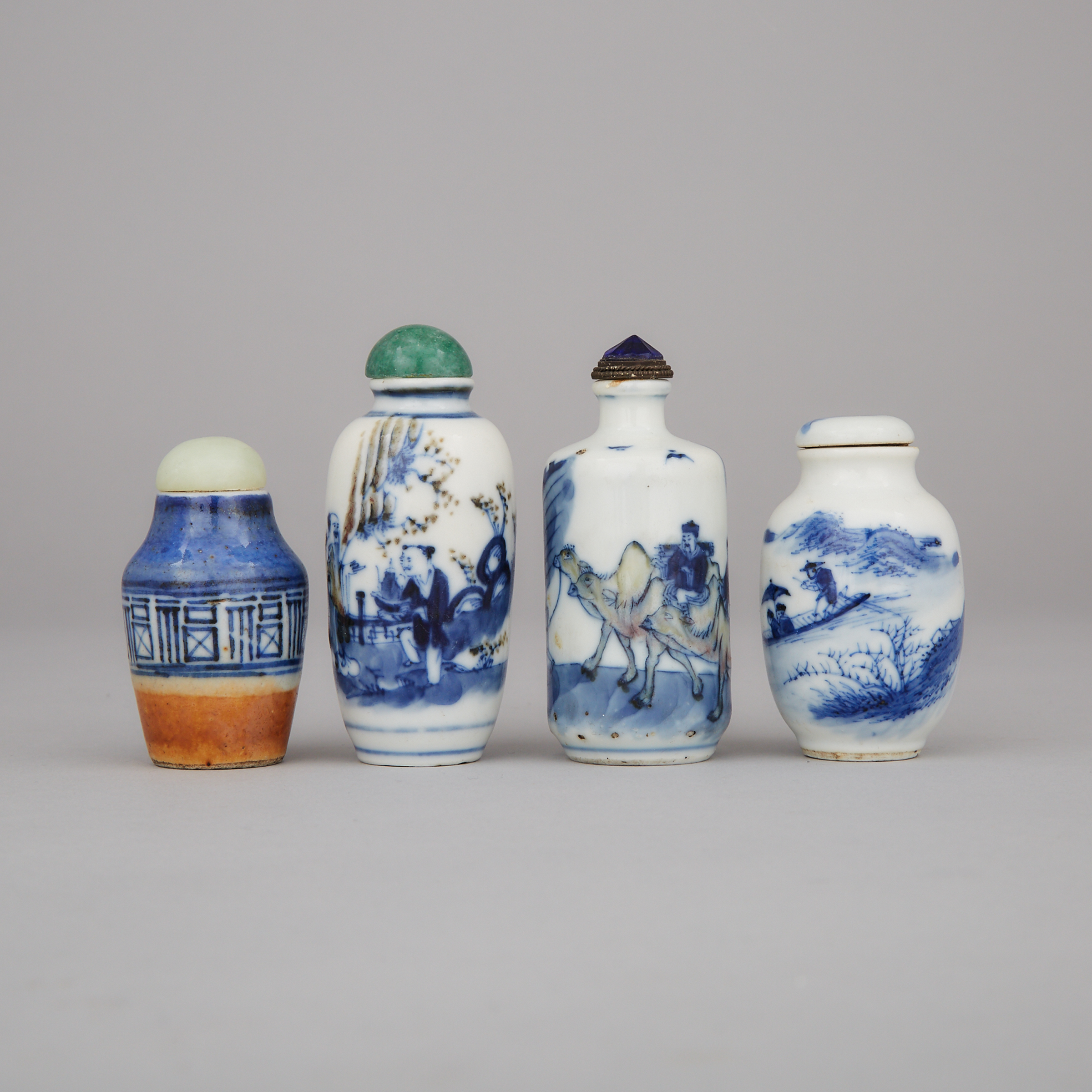 A Group of Four Blue and White Porcelain Snuff Bottles