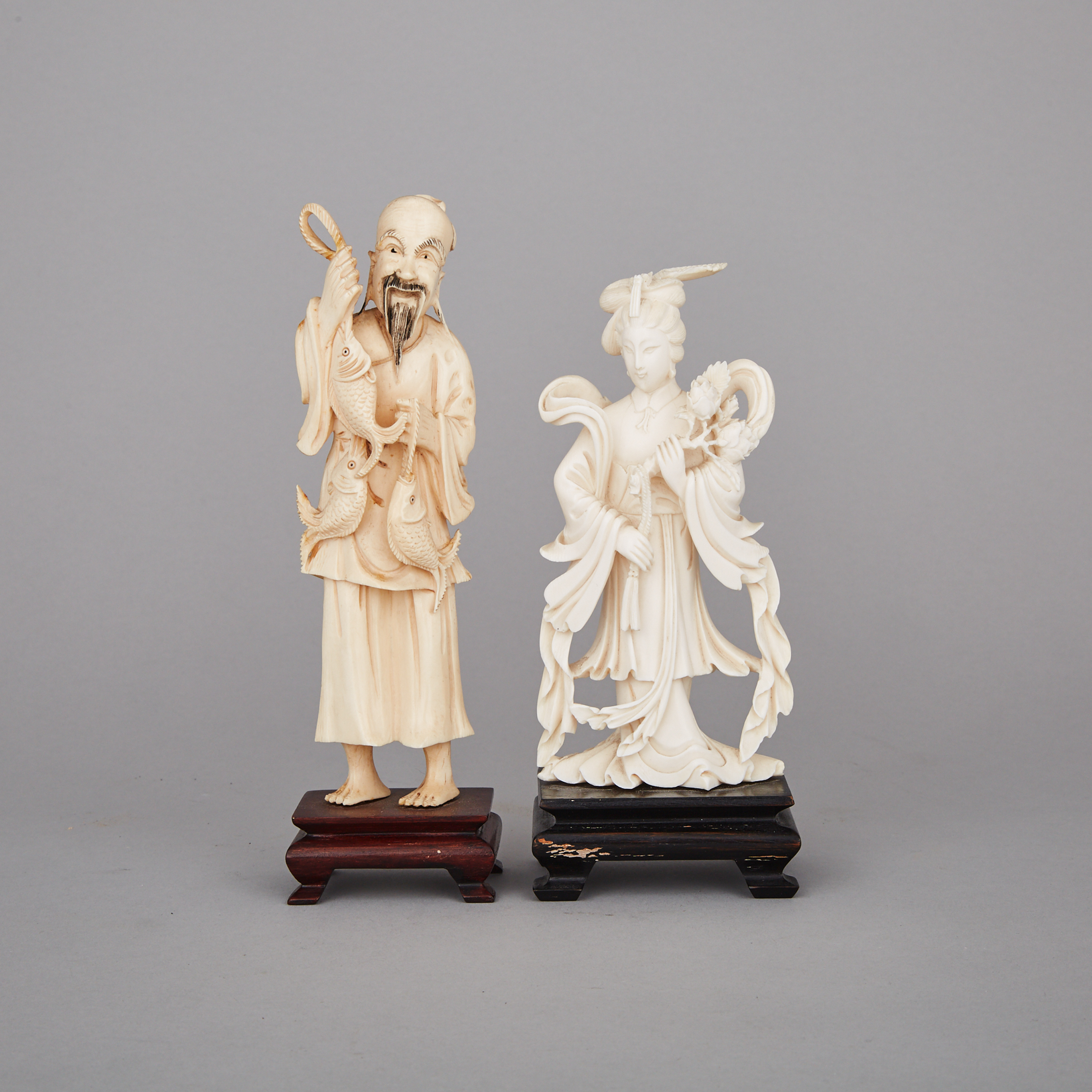 Two Ivory Carved Standing Figures