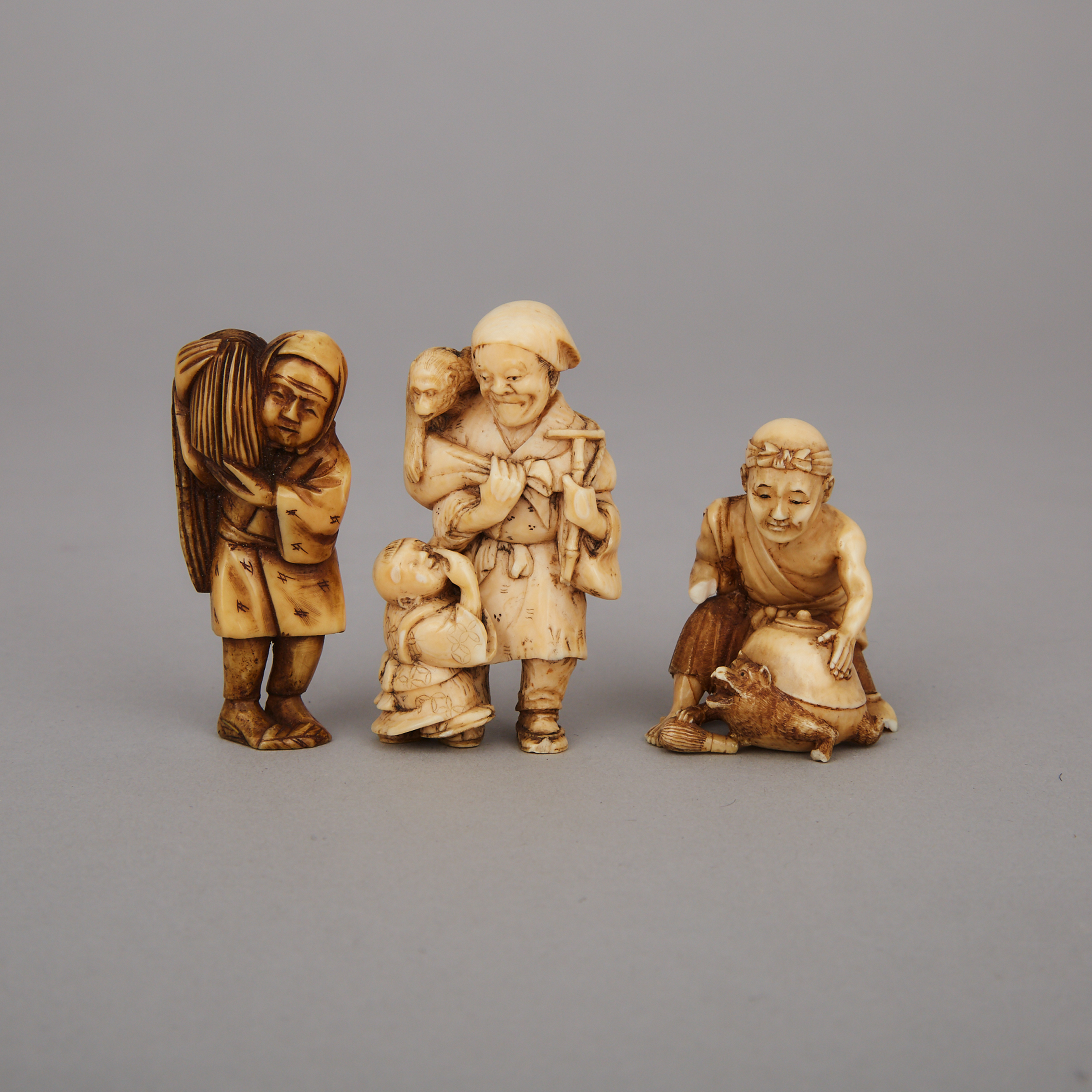 A Group of Three Ivory Netsuke, Meiji Period