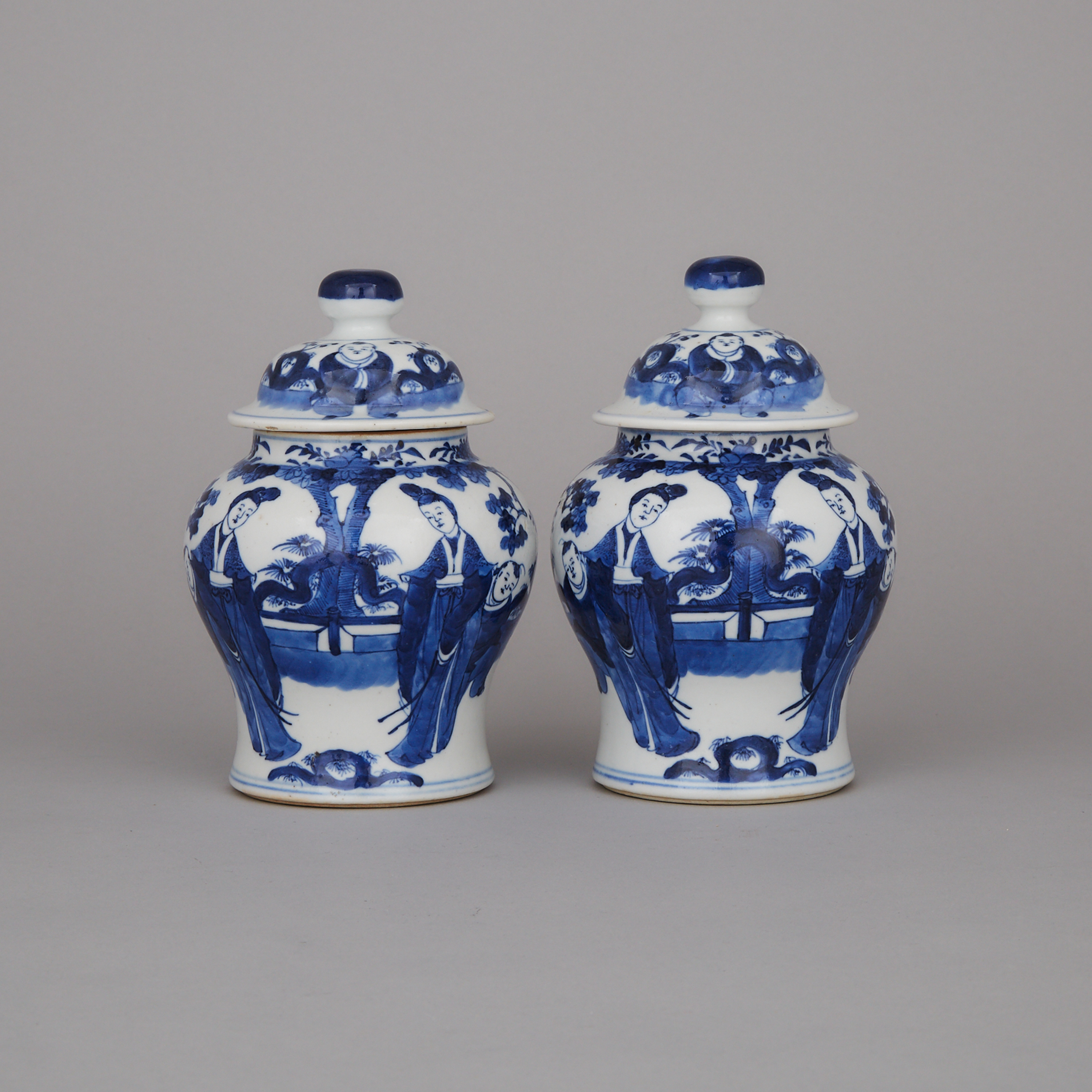 A Pair of Blue and White Lidded Jars