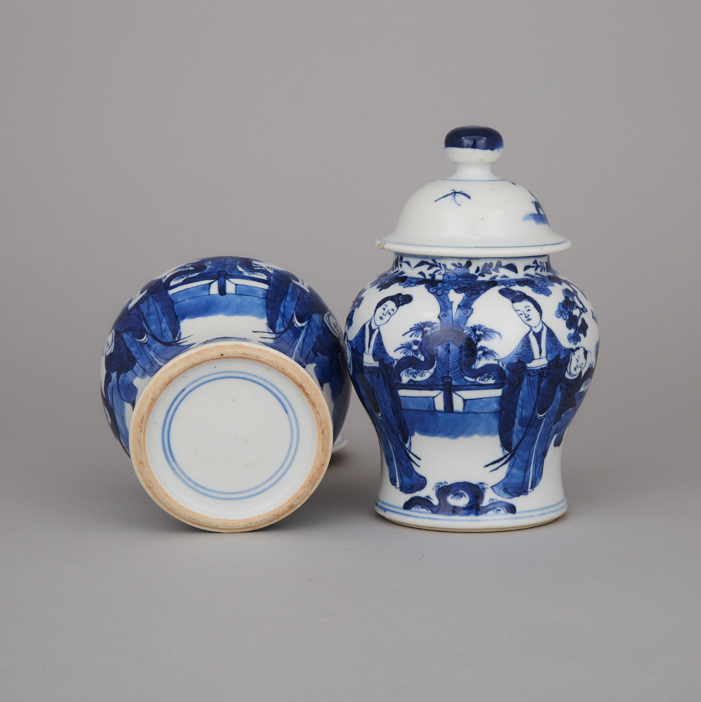 A Pair of Blue and White Lidded Jars