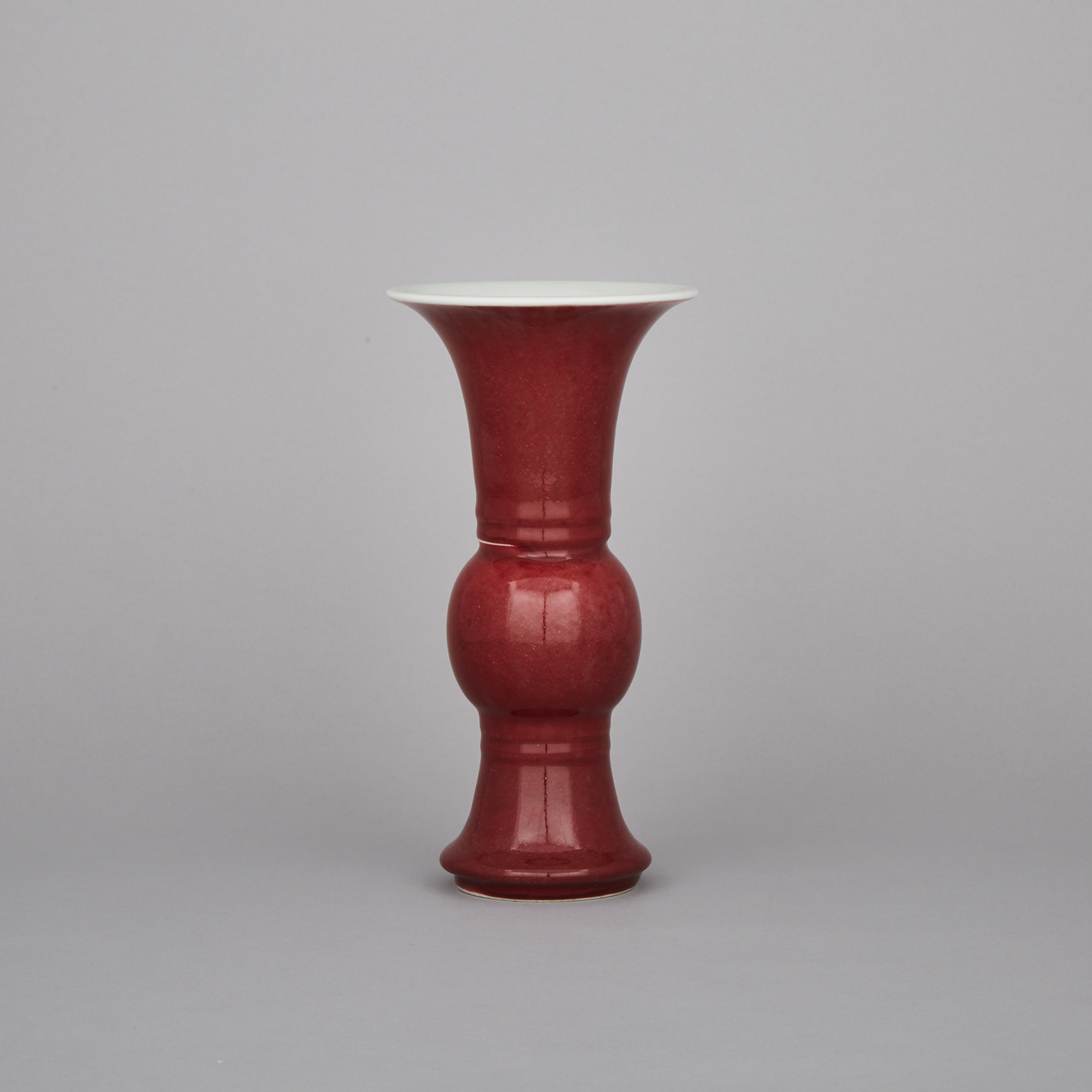 A Red Glazed Gu Vase