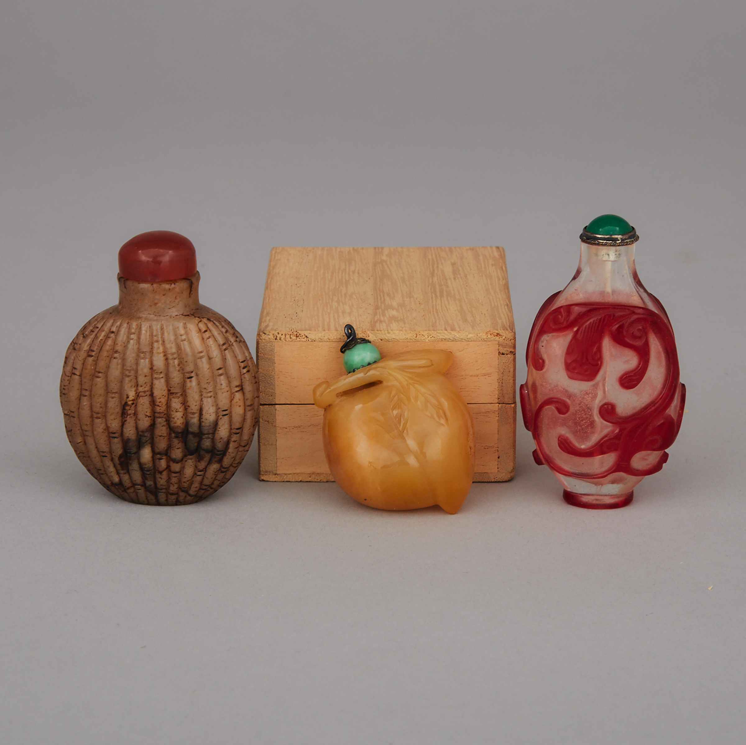 A Group of Three Snuff Bottles, 19th Century