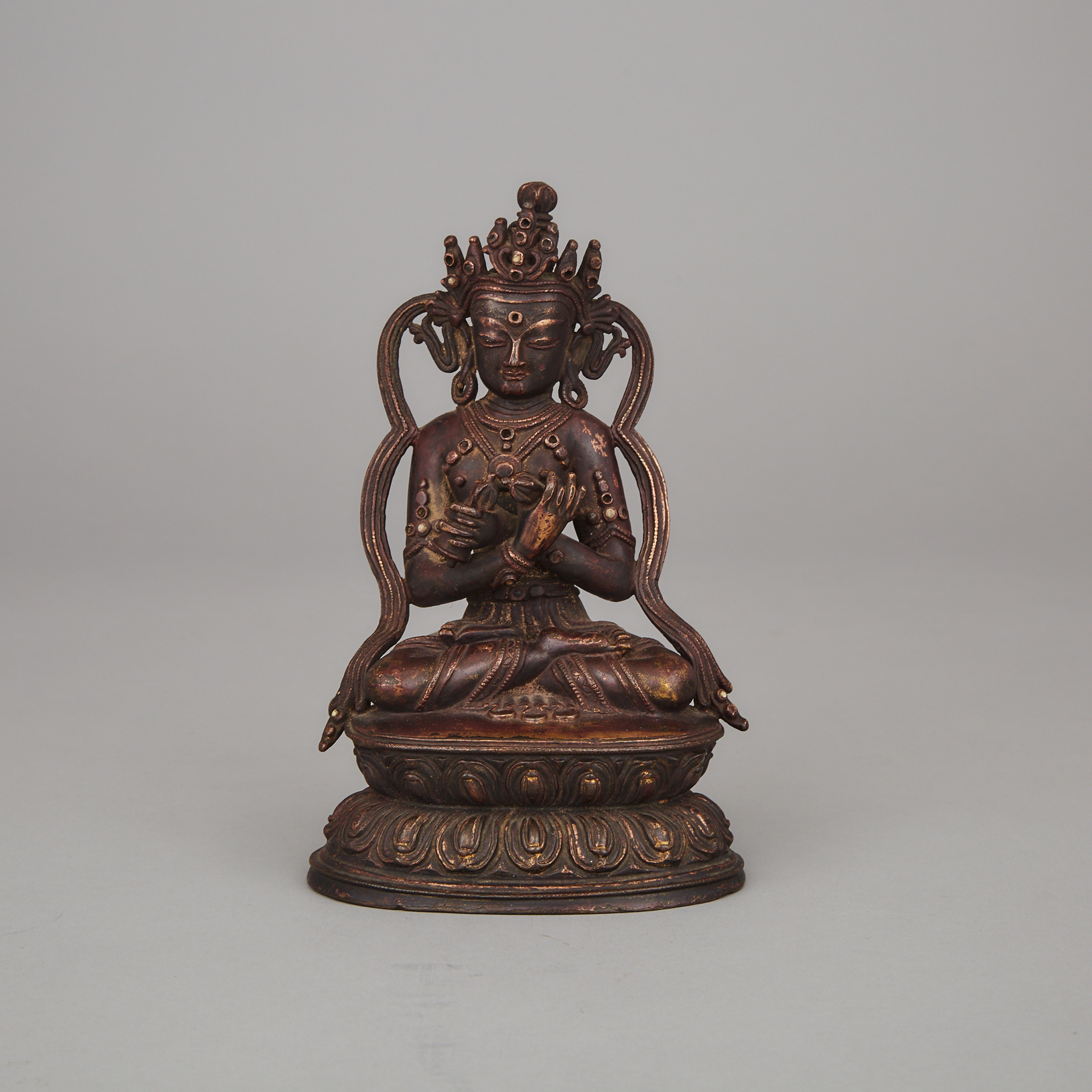 A Tibetan Gilt Bronze Vajrasattva, 15th Century