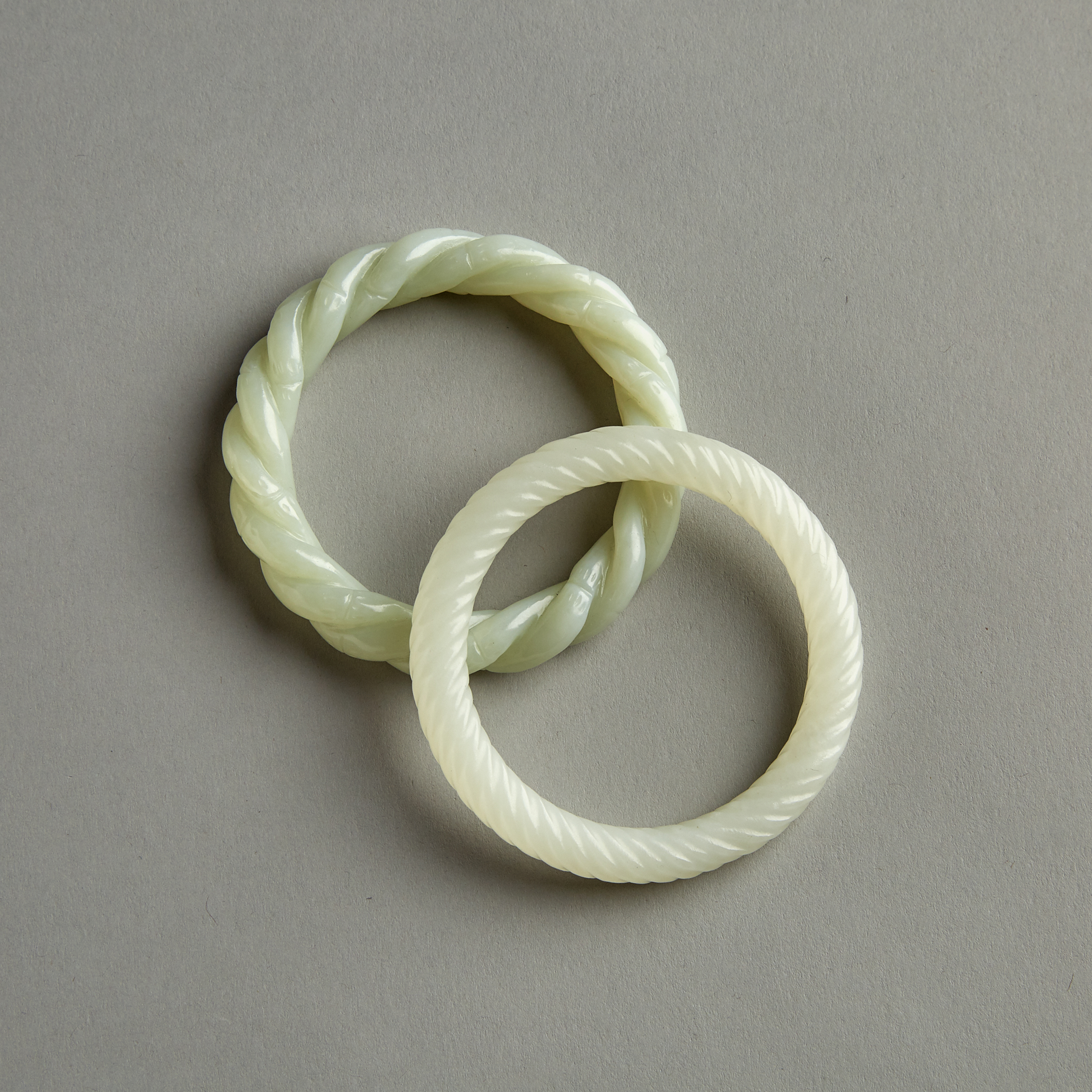 Two Jade Carved Bangles