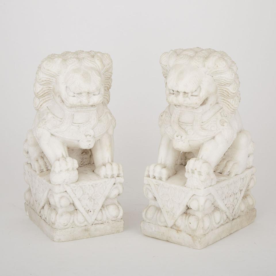 Pair of Chinese Carved White Marble Garden Foo Lions, 20th century