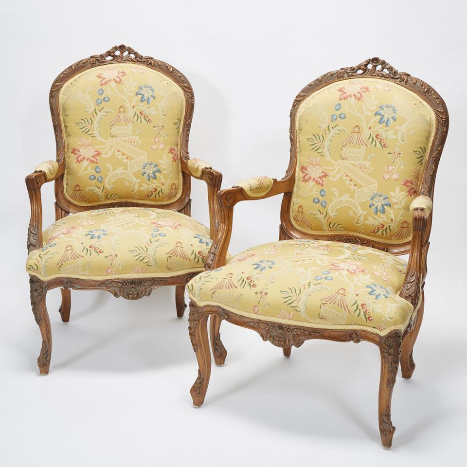 Pair of Louis XV Carved Walnut Fauteuils, early 20th century