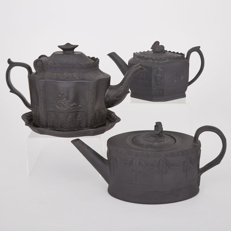 Three English Black Basalt Teapots and a Stand, late 18th/19th century