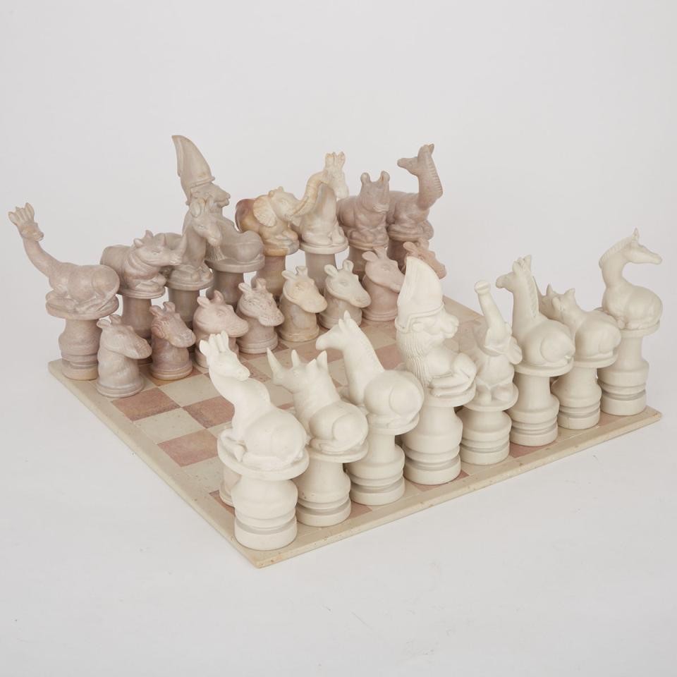 Large Turned and Carved Limestone Animal Form Chess Set and Board, 20th century