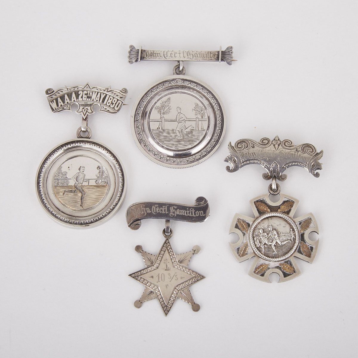 Four Canadian Silver Athletic Medals to John Cecil Hamilton, Stratford Collegiate Institute, Stratford, Ontario, 1889/90