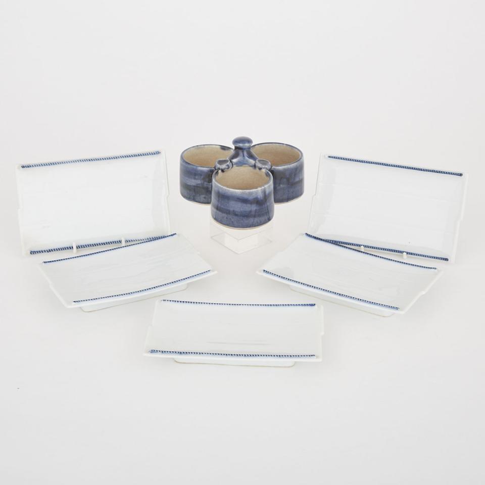 A Set of Five Platters Together with a Three-Cupped Ceramic Piece